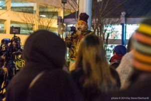 A protestor speaks to the group of protestors at Underground Atlanta