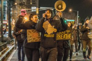 Oscar Cain leads protesters through Atlanta in protest of police violence