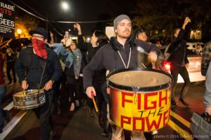 Protesters march through Atlanta playing drums