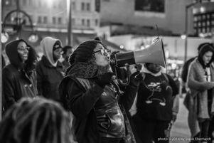 Nelini Stamp speaks to protestors at Underground Atlanta