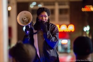 A protester speaks to protesters during the Slaughter of the Innocent protest