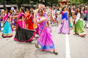 A dancer dances through the streets of Atlanta