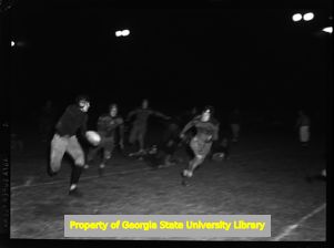 High school football game, Atlanta, Georgia, circa late 1930s or early 1940s