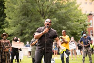 Francys Johnson speaks to protesters gathered in Woodruff Park