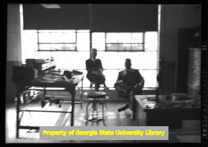 Two men in an office at Atlantic Steel(?), Atlanta, Georgia, circa late 1930s or early 1940s