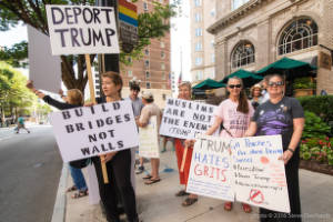 "Deport Trump" and "Build Bridges Not Walls" signs, Trump Campaign Rally Protest
