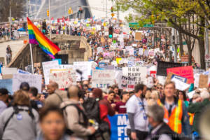 Thousands of protesters fill a street