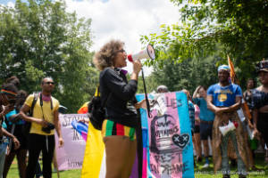 Protester speaks on a megaphone
