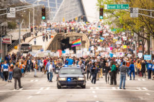 Thousands of protesters fill a street