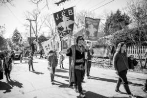 Group with signs, "Jefferson City Buzzards"