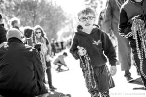 Young boy with beads