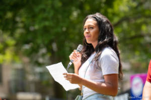 Protester speaks on microphone