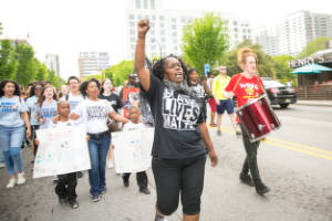 Dawn Oneal leads marchers on 10th St.