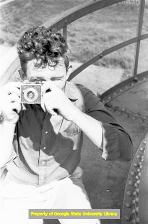 Photograph of photographer David Lennox Jr. on top of a tower, Atlanta, Georgia, circa late 1930s or early 1940s