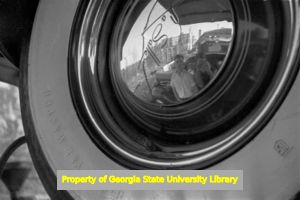 Hubcap self-portrait, Atlanta, Georgia, circa late 1930s or early 1940s