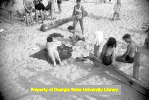 Families play on the beach in Key West, Florida, June 1939