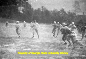 High school football game, Atlanta, Georgia, circa late 1930s or early 1940s