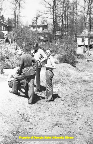 Teenager plotting in the suburbs, Atlanta, Georgia, circa late 1930s or early 1940s