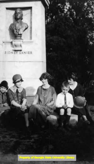 Frances Welch (left), Margaret Welch, an unidentified woman, James Welch, and Mrs. Scenus P. Welch at the Sidney Lanier monument in Piedmont Park, Atlanta, Georgia, ca. 1925.
