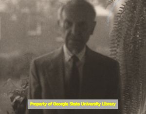 Portrait photograph of Ernest G. Welch with ferns, self-portrait, Atlanta, Georgia, November 13, 1994.