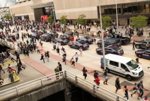 Protesters begin to run down the street and away from where Officers were gathered