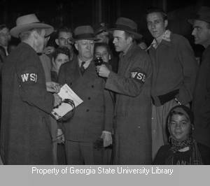 Mobile news correspondents conducting interview