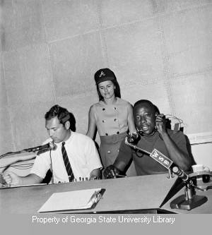 Phil Schaefer interviewing Atlanta Braves player Hank Aaron