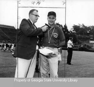 Frank Stiteler interviewing University of Georgia football coach