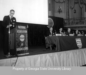 Elmo Ellis speaking at National Association of Broadcasters event