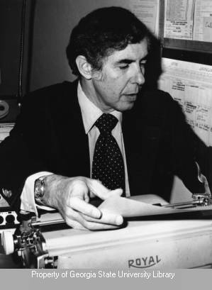 Art Collier at a typewriter
