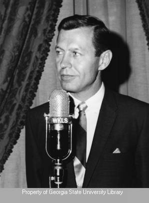 Governor Carl Sanders at a WKLS microphone