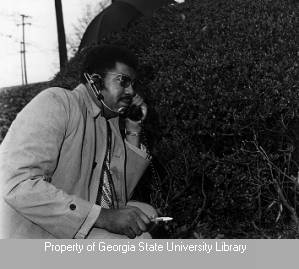 Dave Derokey using remote communication equipment