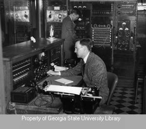H. White and Marshall Davis Jr. in WSB control room