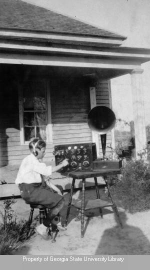 Boy using School of the Air radio receiver