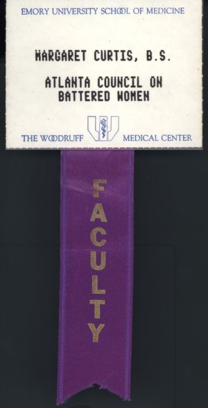 Atlanta Council on Battered Women [name badge with ribbon], circa 1980s