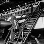 Melvin Fisher, radio mechanic, on the job, 1968
