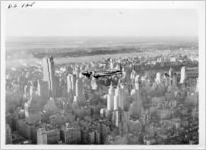 Eastern Air Lines Silverliner flying near Manhattan, circa 1950s