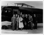 Passengers standing beside an Eastern Air Transport Curtiss Condor, circa 1930s