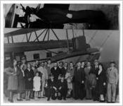 Passengers and flight crew standing beside an Eastern Air Transport Curtiss Condor, circa 1930s