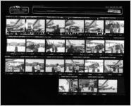 Eastern Air Lines employees with Frank Borman during publicity shoot at Atlanta International Airport [contact sheet], 1983-04-29