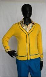 Eastern Air Lines flight attendant uniform, yellow cardigan and slacks, circa early 1970s