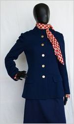 Eastern Air Lines flight attendant uniform, red and tan houndstooth bodysuit, circa late 1970s