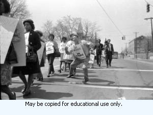 Sanitation workers strike supporters marching in downtown Atlanta, Georgia, March 28, 1970. Photograph is part of a series labeled "Strike march."