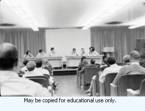 Panel discussion or debate teams, one of six seemingly unrelated photos on same roll of film as Atlanta 1970 Sanitation Strike photos, labeled "Sheraton Emory Garbage Strike."
