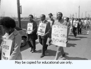 Sanitation workers strike supporters marching in downtown Atlanta, Georgia, March 28, 1970. Photograph is part of a series labeled "Strike march."