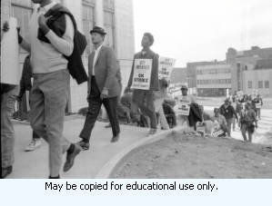 Atlanta Garbage Strike protestors climbing the steps to the plaza in front of Atlanta City Hall, Atlanta, Georgia, March 31, 1970. Part of a series labeled "Strike."