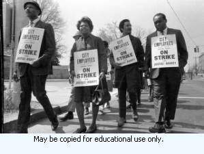 Sanitation workers strike supporters marching in downtown Atlanta, Georgia, March 28, 1970. Photograph is part of a series labeled "Strike march."