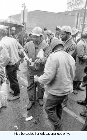 Sanitation workers strike, strike supporters outside in downtown Atlanta, Georgia, March 20, 1970. This is part of a series labled "Garbage Strike."