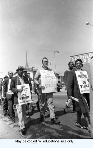Sanitation workers strike supporters marching in downtown Atlanta, Georgia, March 28, 1970. Photograph is part of a series labeled "Strike march."