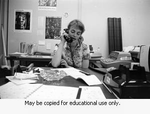 Lady Working at her Desk, April 10, 1970.